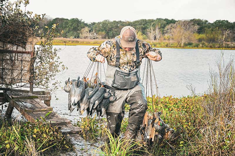 duck hunter with decoys